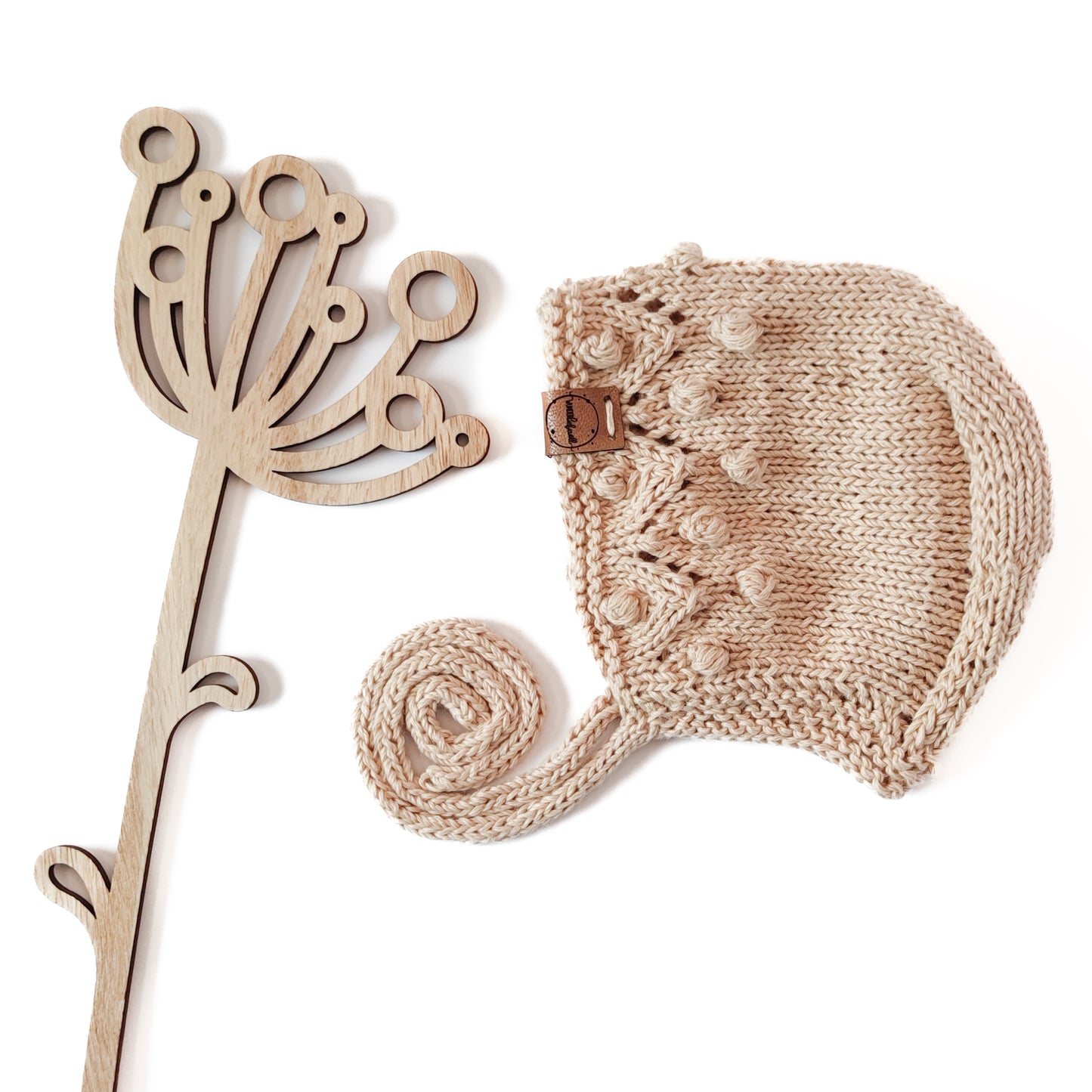 Mütze "Perlentanz" in Sandlicht