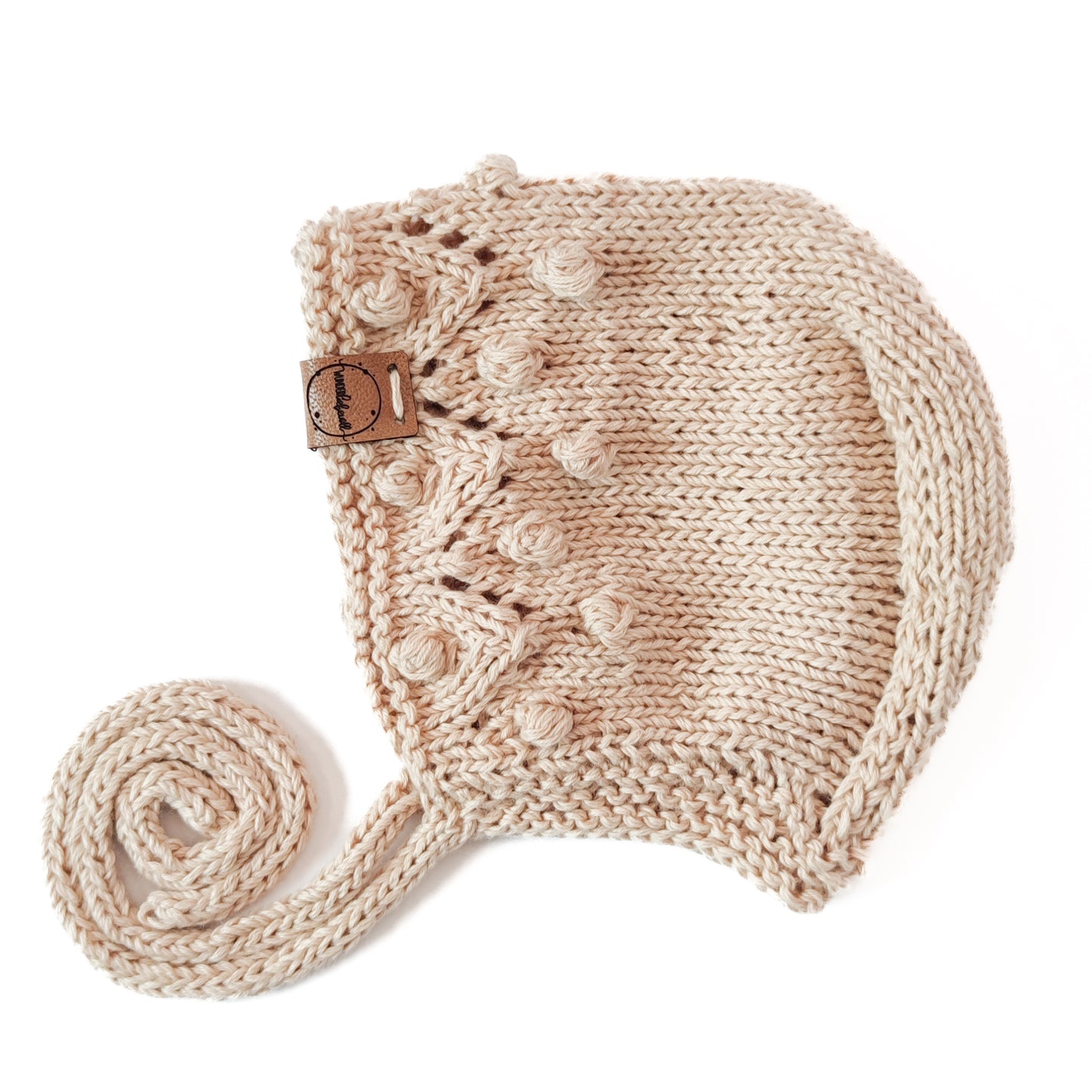 Mütze "Perlentanz" in Sandlicht