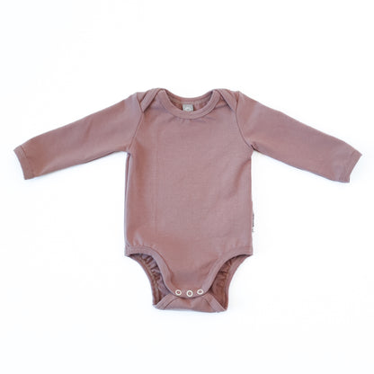 Vorderansicht eines Babybodys mit amerikanischem Ausschnitt in der Farbe rosa